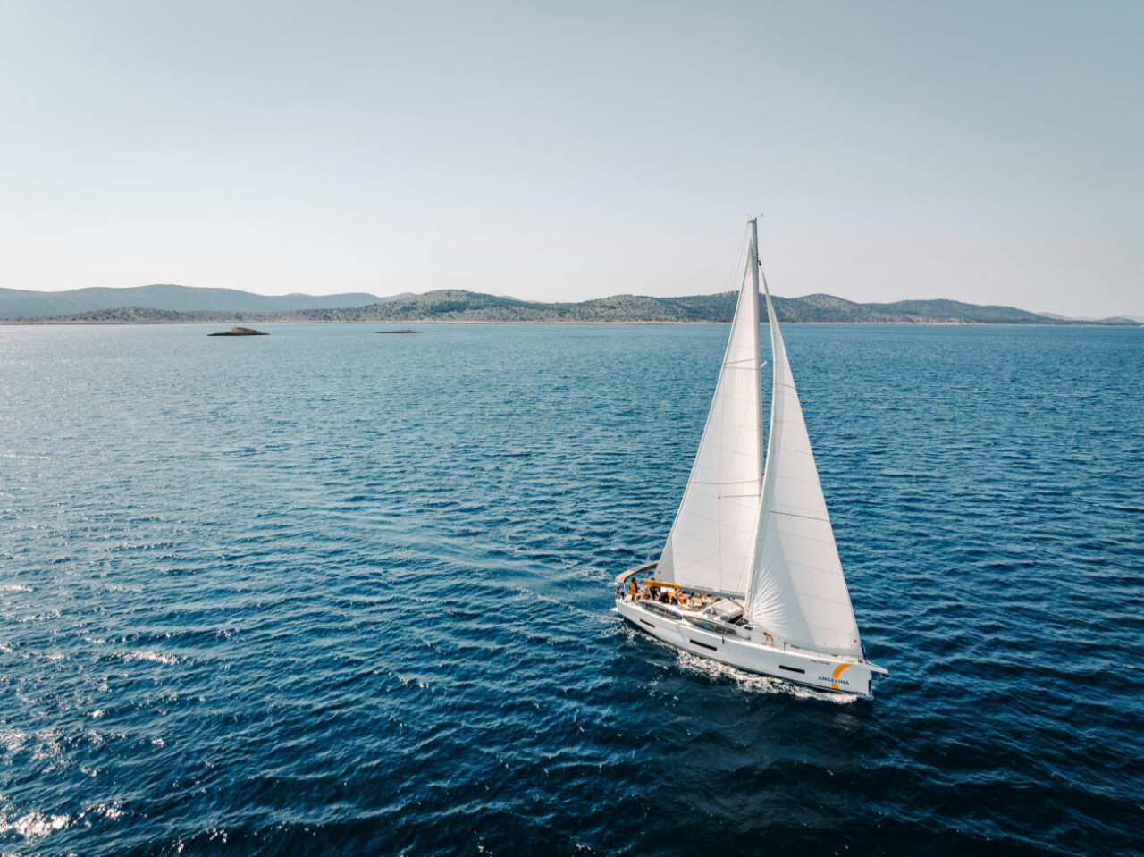 Sailing yacht in front of Kornati islands